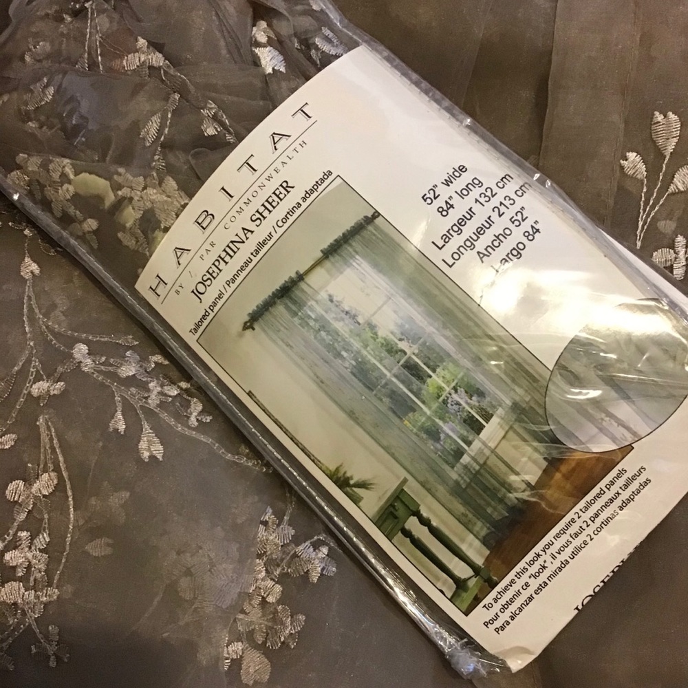 A set of sheer floral Curtains